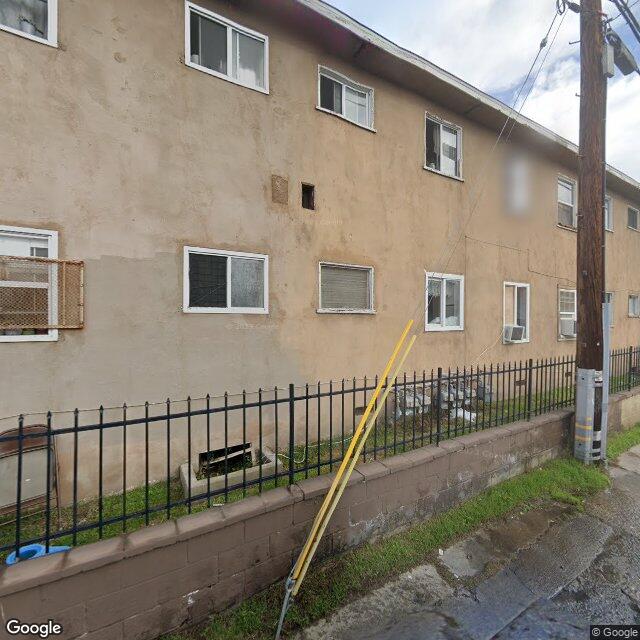 Foreclosed Property at 3116 S NORMANDIE AVE
