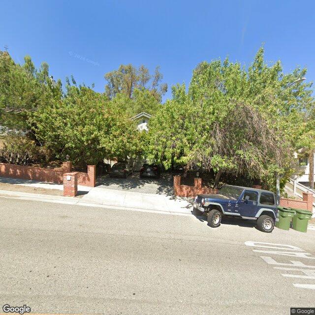 Foreclosed Property at 11922 N LOUISE AVE